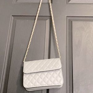 Grey women’s hand bag.